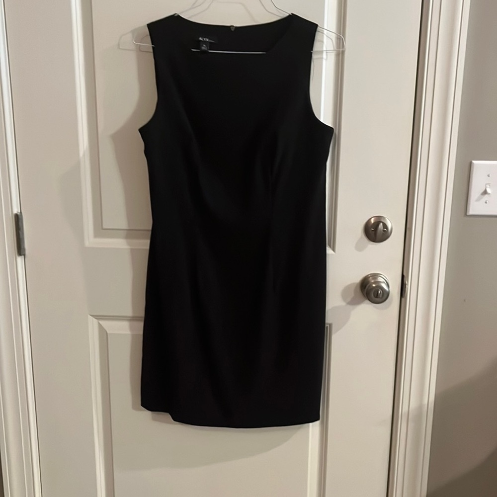 Solid black size 14 sheath dress.